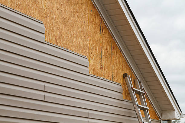 Professional Emergency Siding Repair technician working in Dunkirk, OH